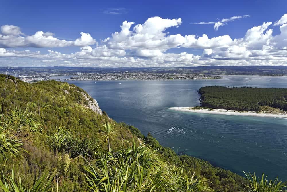 Matakana Island and entrance to harbor from Mount Maunganui. New Zealand