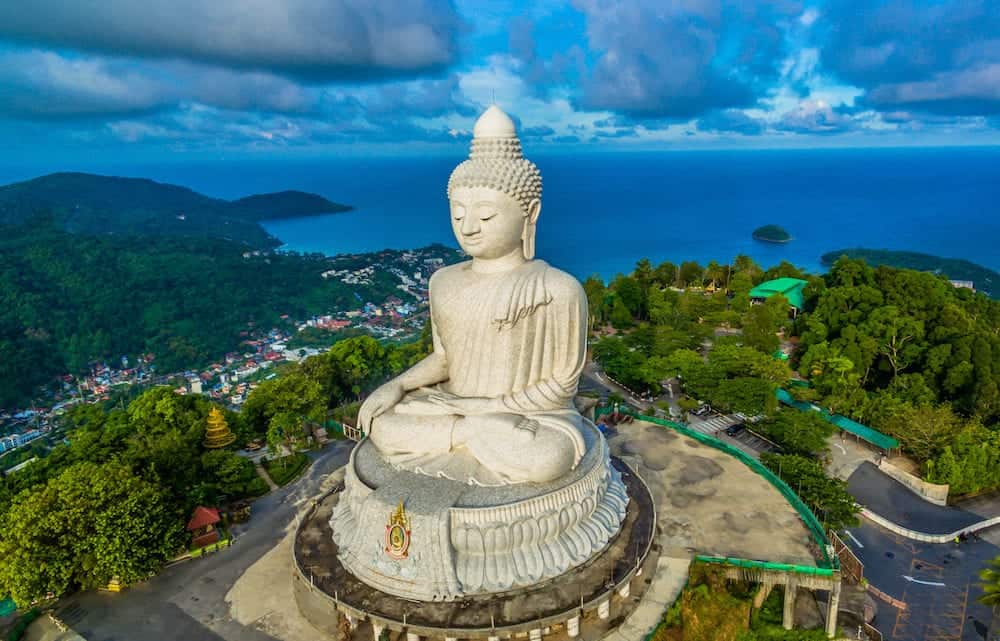 blue sky and blue ocean are on the back of Phuket Big Buddha statue.white Phuket big Buddha is the one of landmarks on Phuket island.