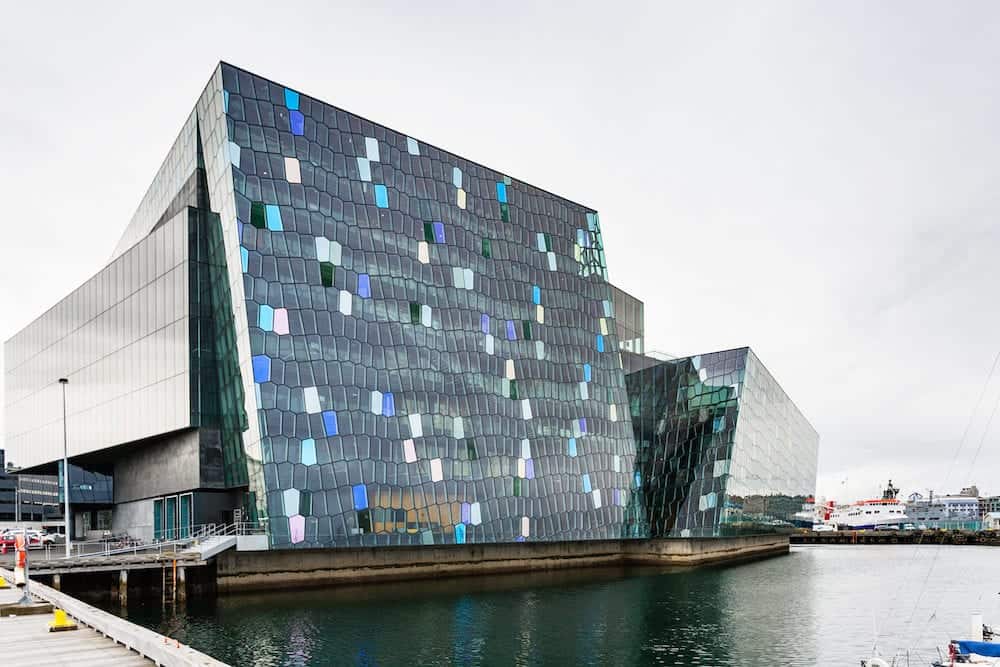 REYKJAVIC ICELAND - Harpa concert hall in Reykjavik city in autumn. Harpa was designed by the firm Henning Larsen Architects with artist Olafur Eliasson Hall was built 2007-2011