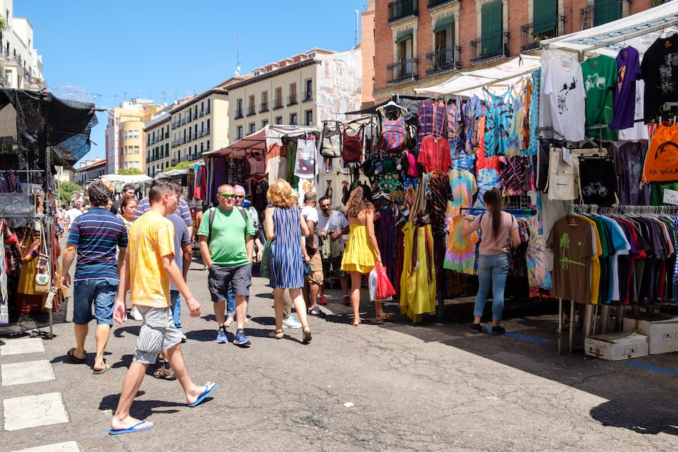 People shopping at El Rastro, the most popular open air market in Madrid