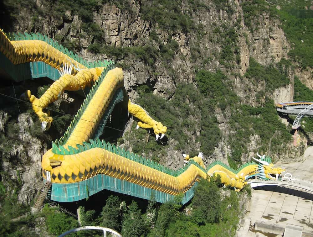 An escalator taking visitors to Longqing Gorge in China is designed to look like a dragon.