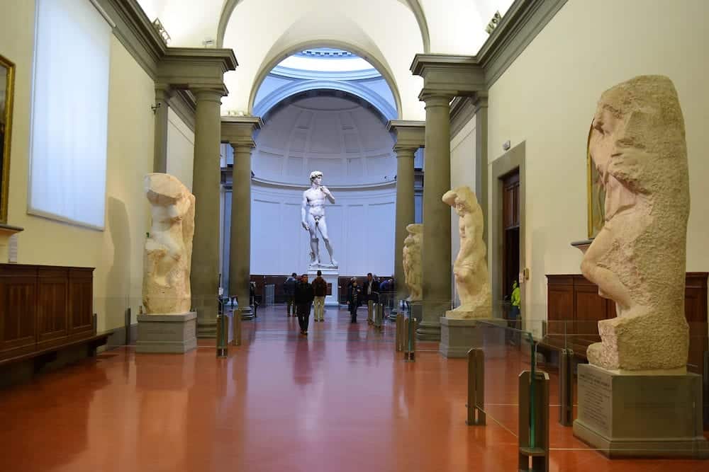 FLORENCE, ITALY - a hall by Michelangelo with David and his unfinished works on display at the Accademia Gallery (Galleria dell'Accademia), Florence, Italy