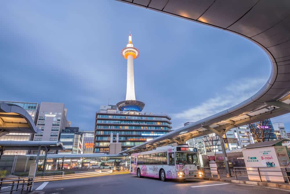 Kyoto Japan - Kyoto Tower in front of Kyoto Stationtower is the tallest in Kyoto height of 131 meters Kyoto Station is the city's transportation hub and also the site of a large bus terminal for city buses.