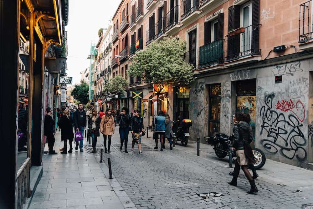 Madrid, Spain - Street scene in Malasana district in Madrid. Malasana is one of the trendiest neighborhoods in Madrid, well known for its counter-cultural scene