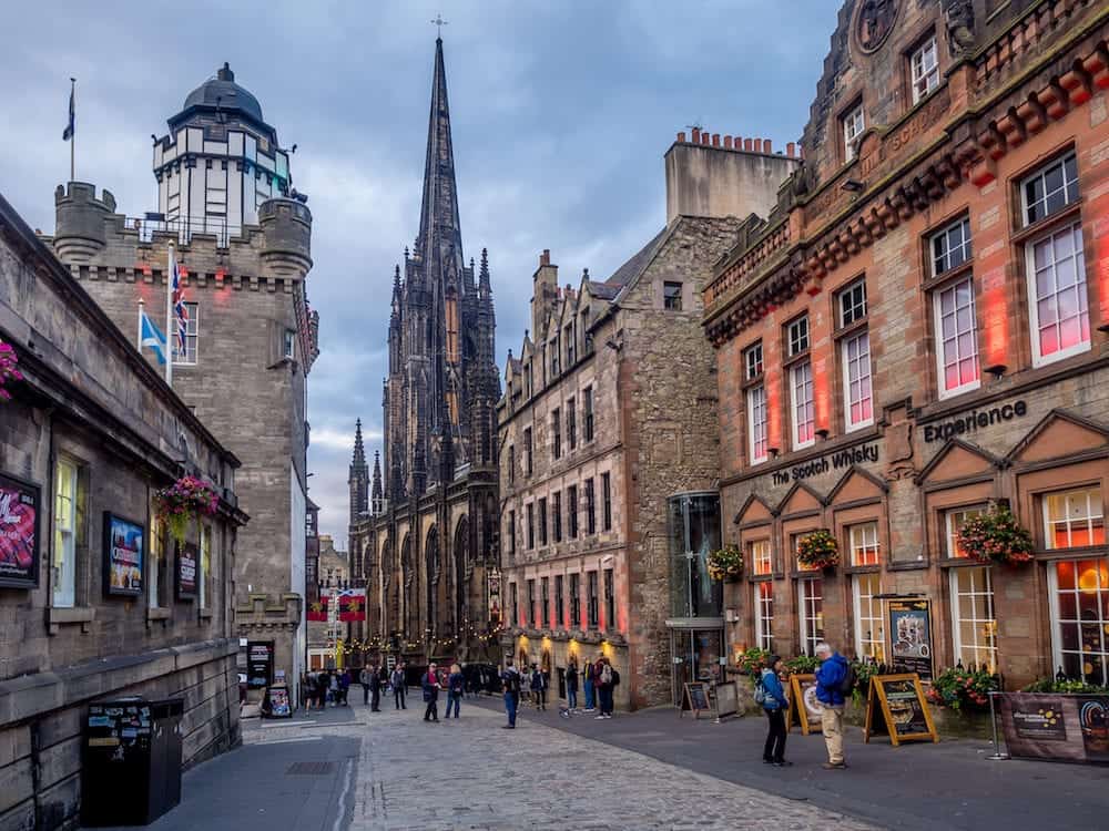 EDINBURGH, SCOTLAND - Looking down the Royal Mile in the Old Town in Edinburgh Scotland. The Royal Mile is the most popular attraction in Edinburgh and hosts many tourists.