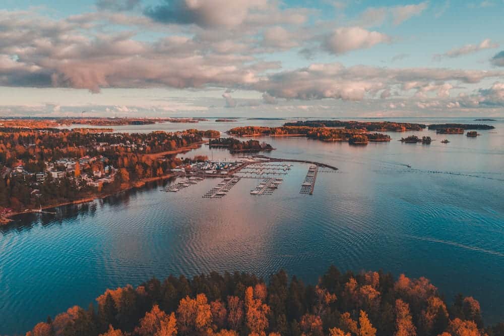 Nuottaniemi marina with boats on pier and on land being stored, Espoo Finland