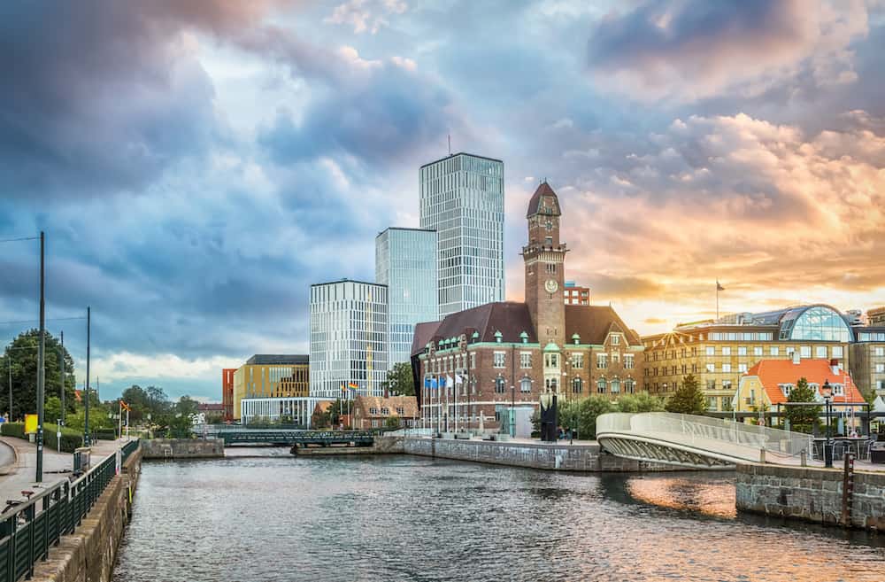 Beautiful cityscape with sunset over canal and skyline in Malmo Sweden