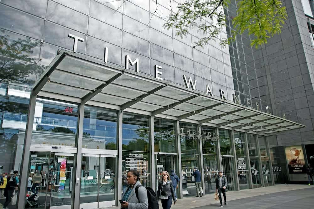 New York - People walk outside the front entrance to the Time Warner Center at Columbus Circle in Manhattan.