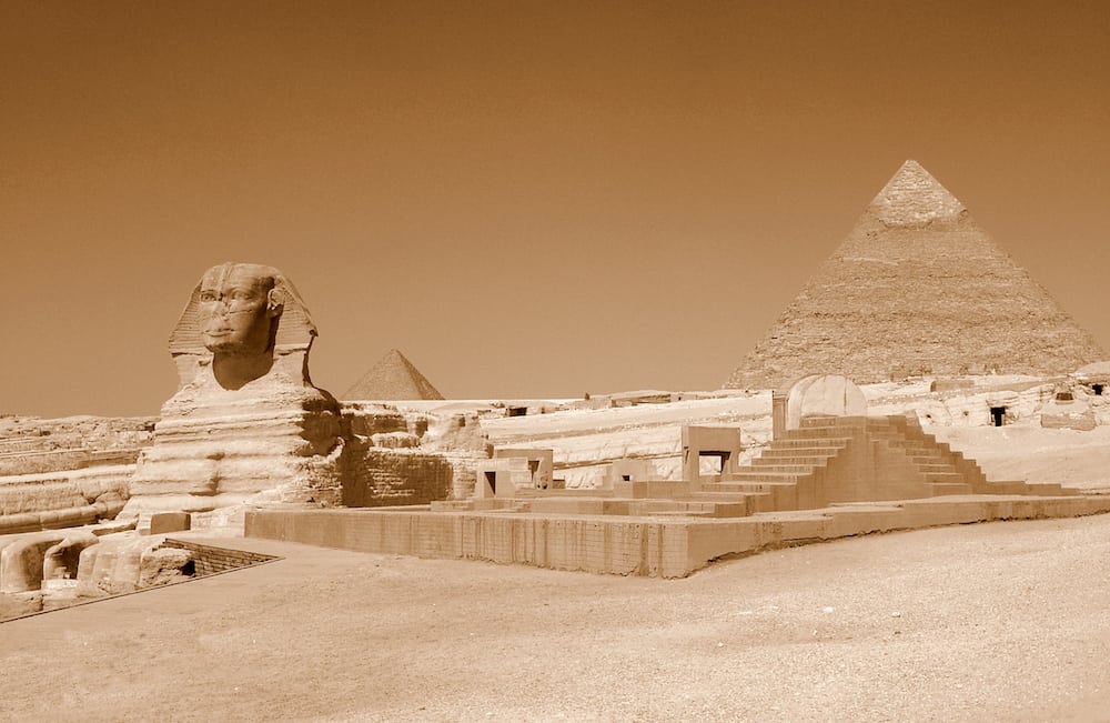 The enigmatic Sphinx, and the mighty pyramid.