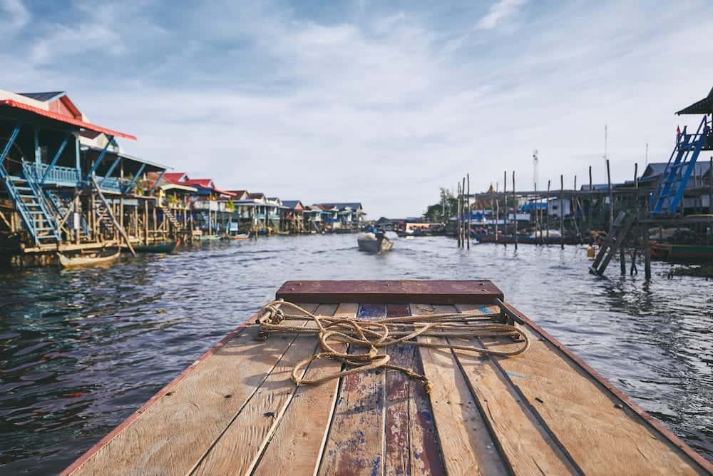 Boat in the middle of the floating village on Tonle Sap Lake. Siem Reap Province, Cambodia.