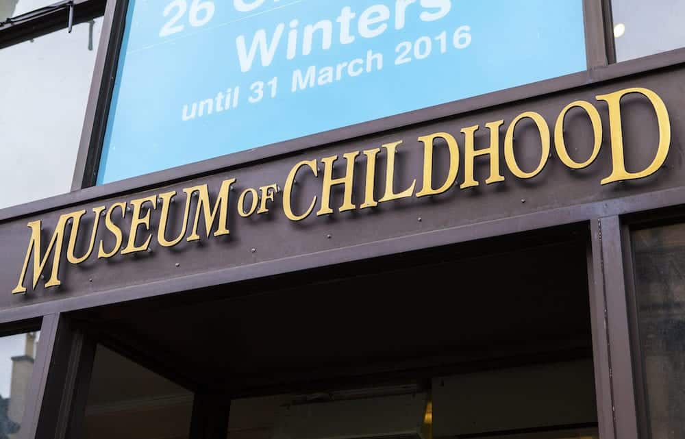 EDINBURGH SCOTLAND - A view of the sign above the main entrance to the Museum of Childhood in Edinburgh. One of the numerous tourist attractions on the capitals historic Royal Mile.