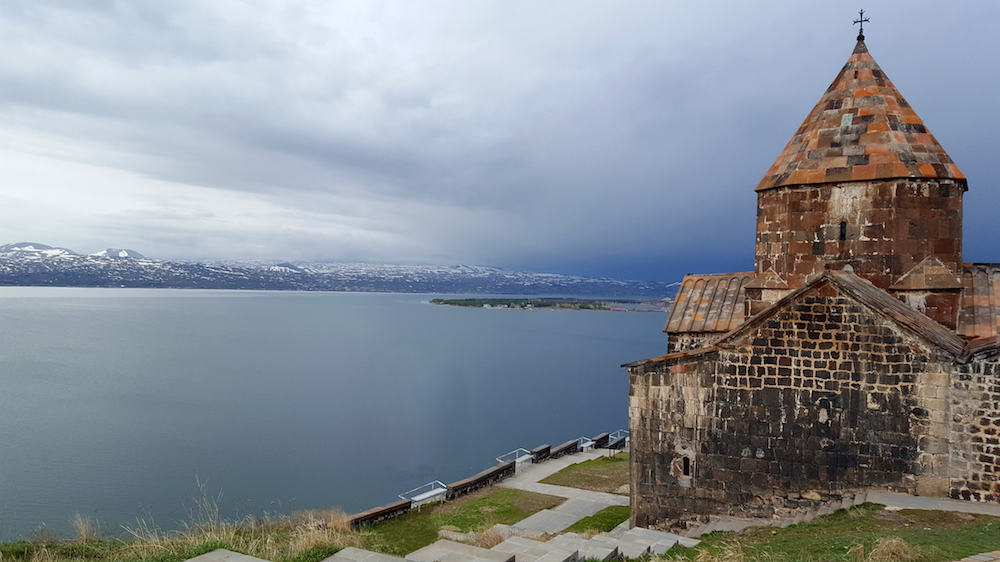Sevan, Armenia - The ancient Sevanavank monastery, lake Sevan in the background Sevan, Armenia