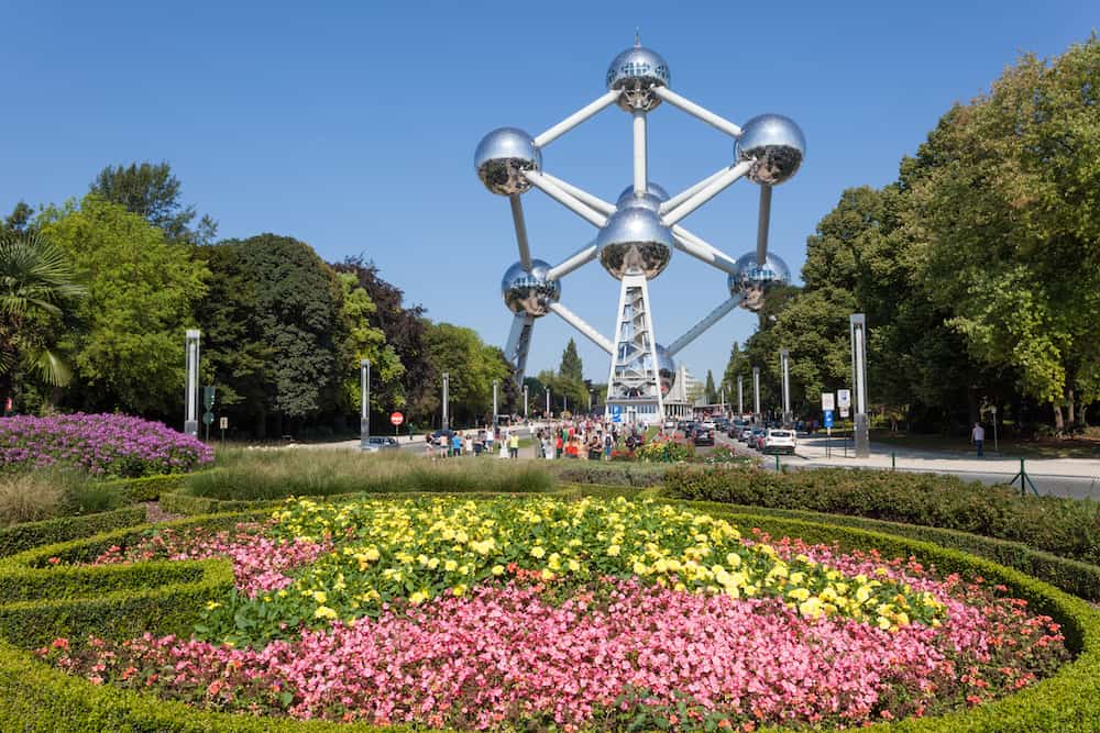 BRUSSELS BELGIUM - Flower bed and the Atomium building at the World Fair grounds in Brussels.