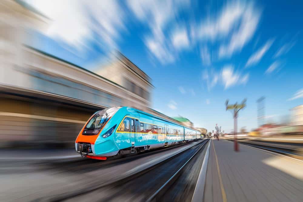 High-speed train with motion blur. Train at the railway station. Train station. Train at the station.