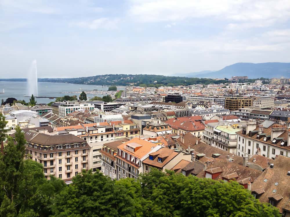 Top view of Geneva old town and Lake Geneva with Jet d'eau fountain as symbol of Geneva city, Switzerland, Europe.