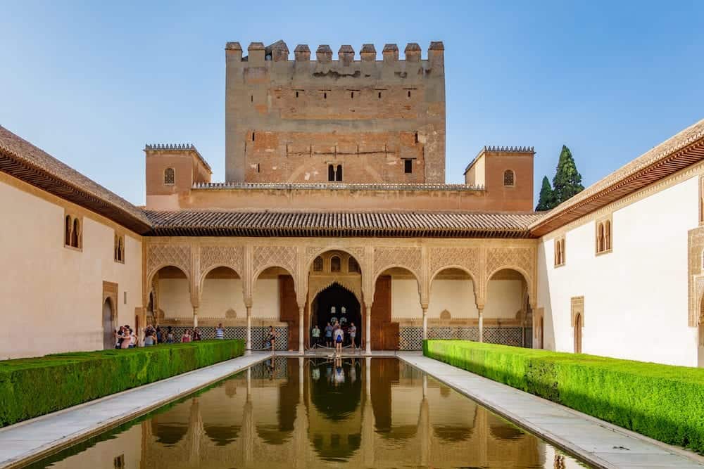 Granada, Spain - General view of The Generalife courtyard with its famous fountain and garden inside the Alhambra in Granada, Spain