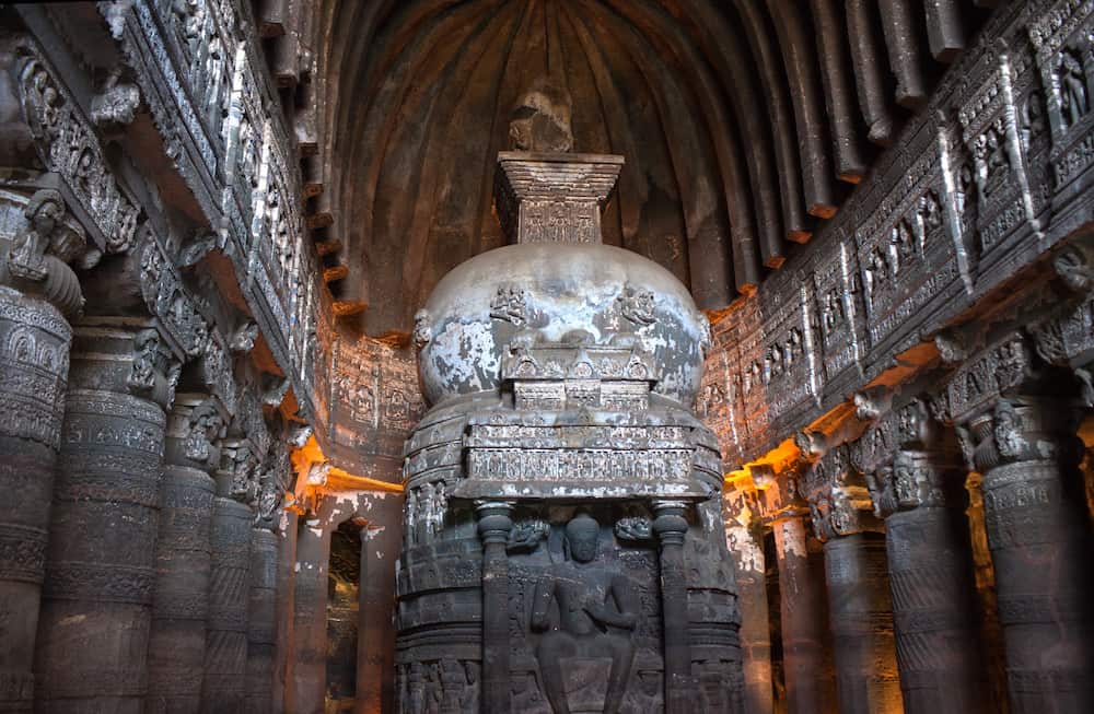 AURANGABAD, INDIA - Ancient buddhist stupa with Buddha statue in famous Ajanta caves in Maharashtra state
