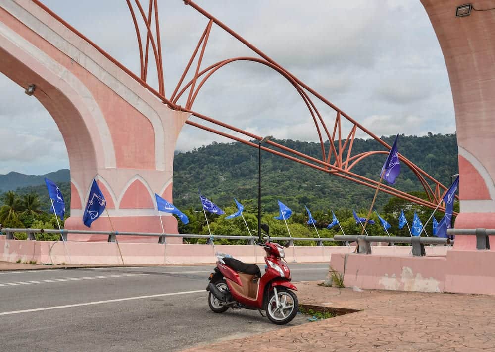 Langkawi, Malaysia - . A scooter parking on rural road in Langkawi Island, Malaysia.