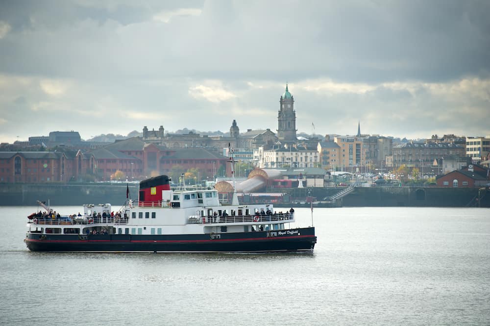 LIVERPOOL, UK - The Mersey Ferry MV Royal Daffodil of the Mersey passes the Liverpool shoreline. The Royal Daffodil is a ferry based on the River Mersey, England.