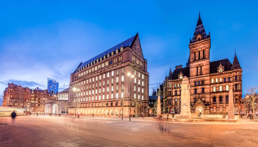 The old and new town hall buildings in the city center of Manchester England.