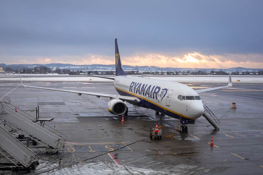 : Preparing for boarding to Ryanair plane on Lech Walesa Airport in Gdansk. Ryanair operates over 300 aircraft and is the biggest low-cost airline company in Europe