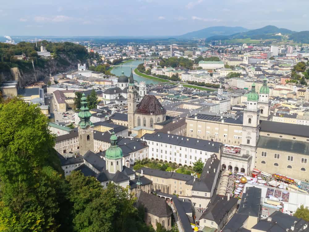 Bird eye view from the walls of the fortress of the Salzach river and the old city in center of Salzburg Austria