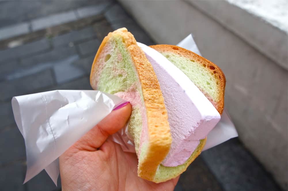 Bread ice cream sandwich in Singapore held in hand