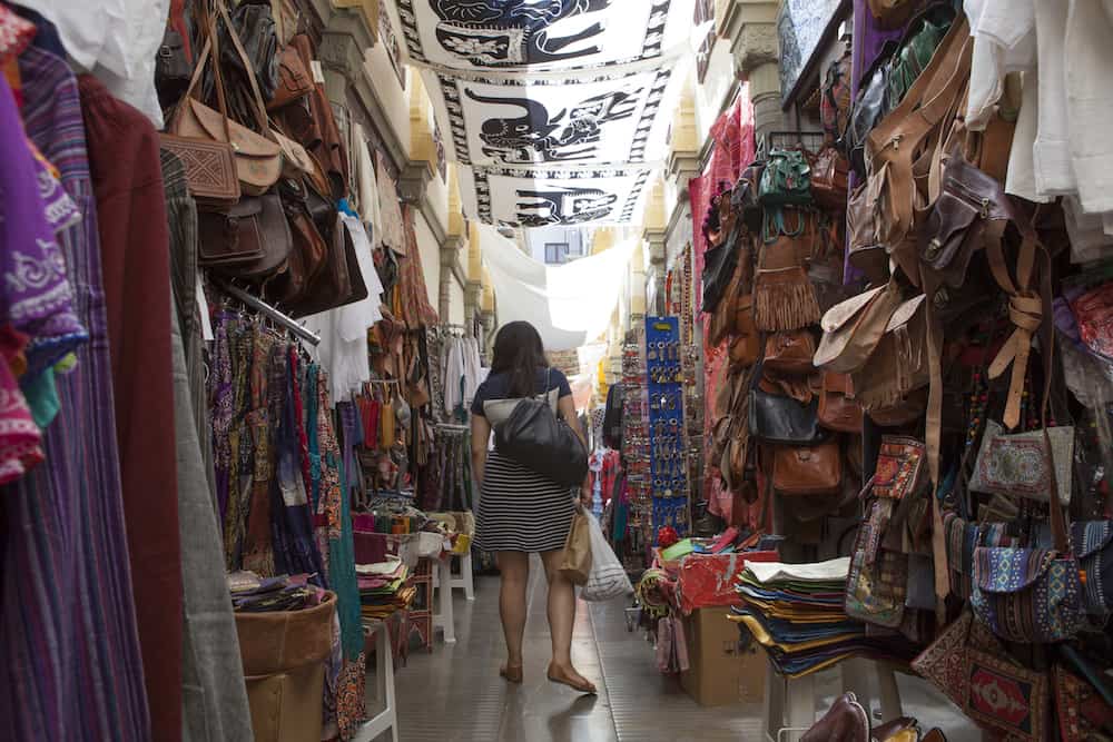 Granada Spain - : Narrow streets filled with shops called Alcaiceria originally home to a Moorish silk market Granada Spain