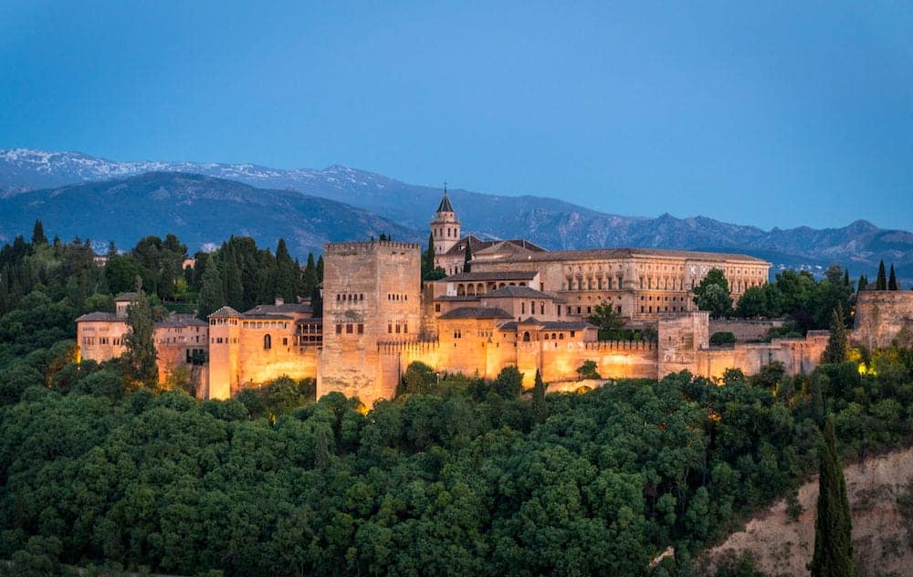 Sunset views of the Alhambra from el Mirador de San Nicolas Granada Andalucia Spain in Summer 2016