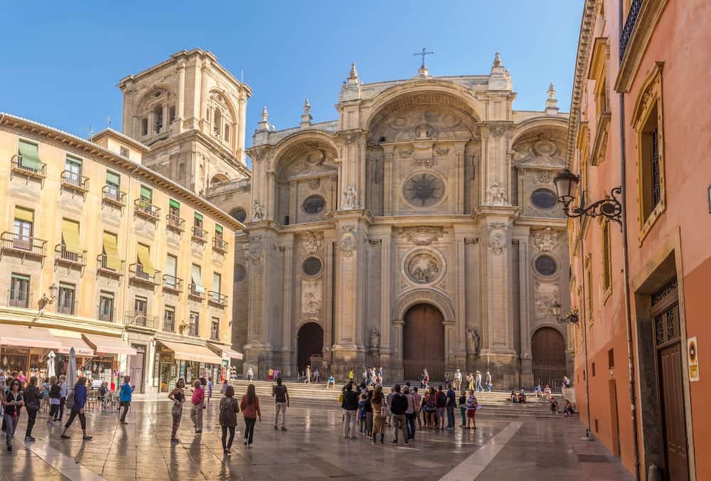 GRANADA,SPAIN - View at the South portal Cathedral of Granada at Pasiegas place. Granada is located at the foot of the Sierra Nevada mountains.