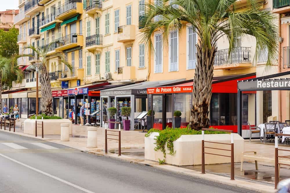 CANNES FRANCE - : Promenade de la Croisette in Cannes. Cannes hosts the annual Cannes Film festival from 1949