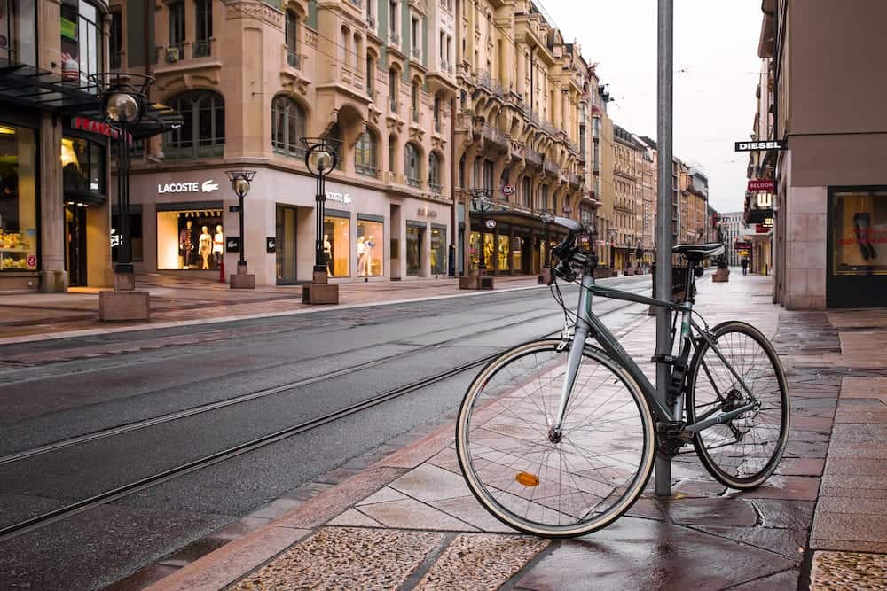 GENEVA, SWITZERLAND - Bicycle on Rue de la Croix-dOr shopping street in Geneva early in the morning
