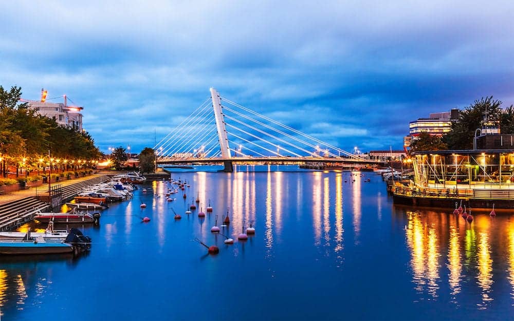 Scenic evening view of the bridge and pier architecture in Ruoholahti district in Helsinki, Finland