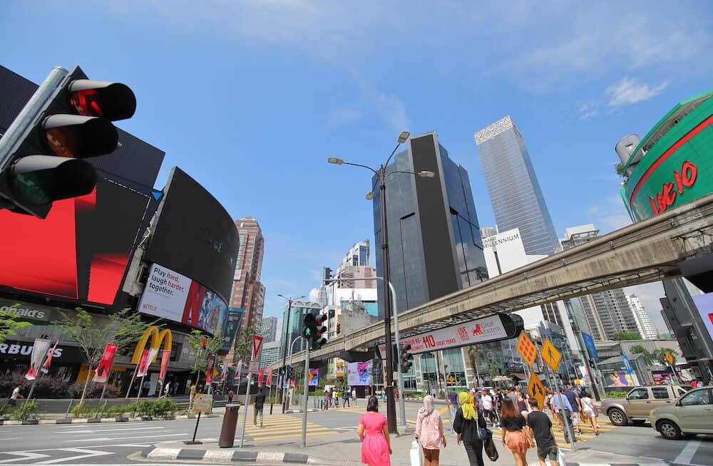 KUALA LUMPUR MALAYSIA -\Unidentified people visit Bukit Bintang shopping street in Kuala Lumpur Malaysia