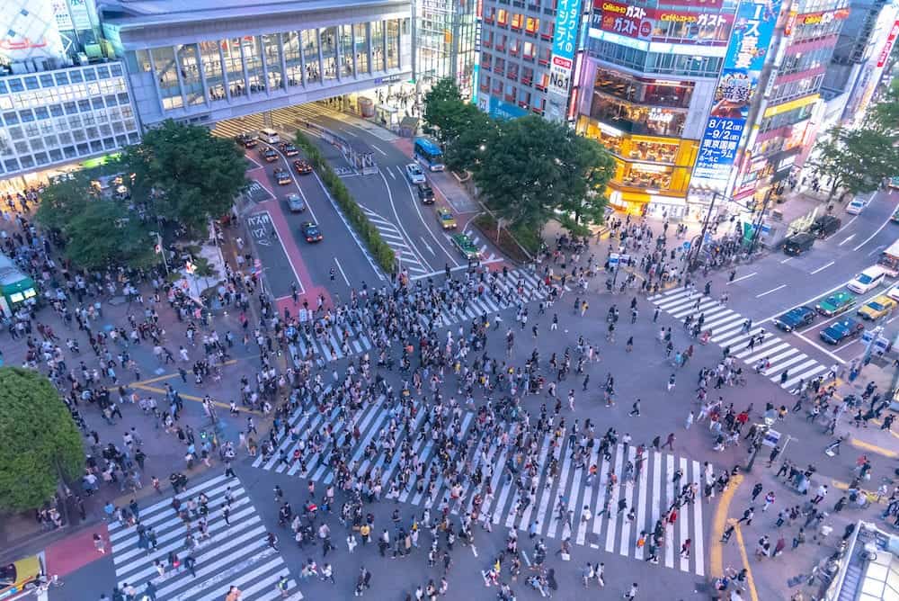 Shibuya, Tokyo, Japan - Pedestrians crosswalk at Shibuya district in Tokyo, Japan. Shibuya Crossing is one of the busiest crosswalks in the world.
