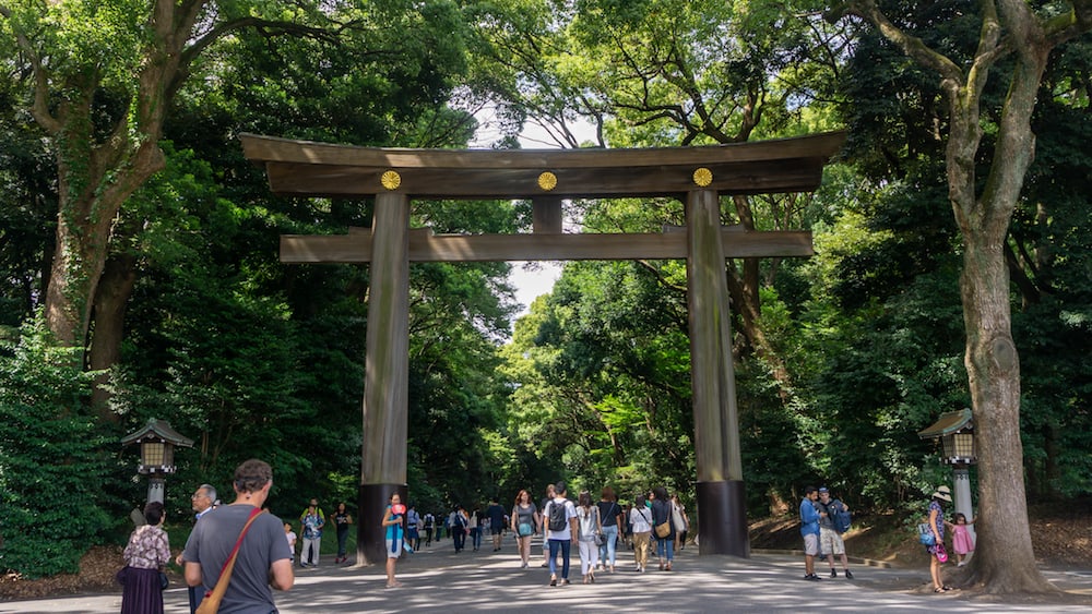 Tokyo, Japan - Unidentified people at the entrance gate of Yoyogi Park near the Meiji Shrine in Shibuya, Tokyo.