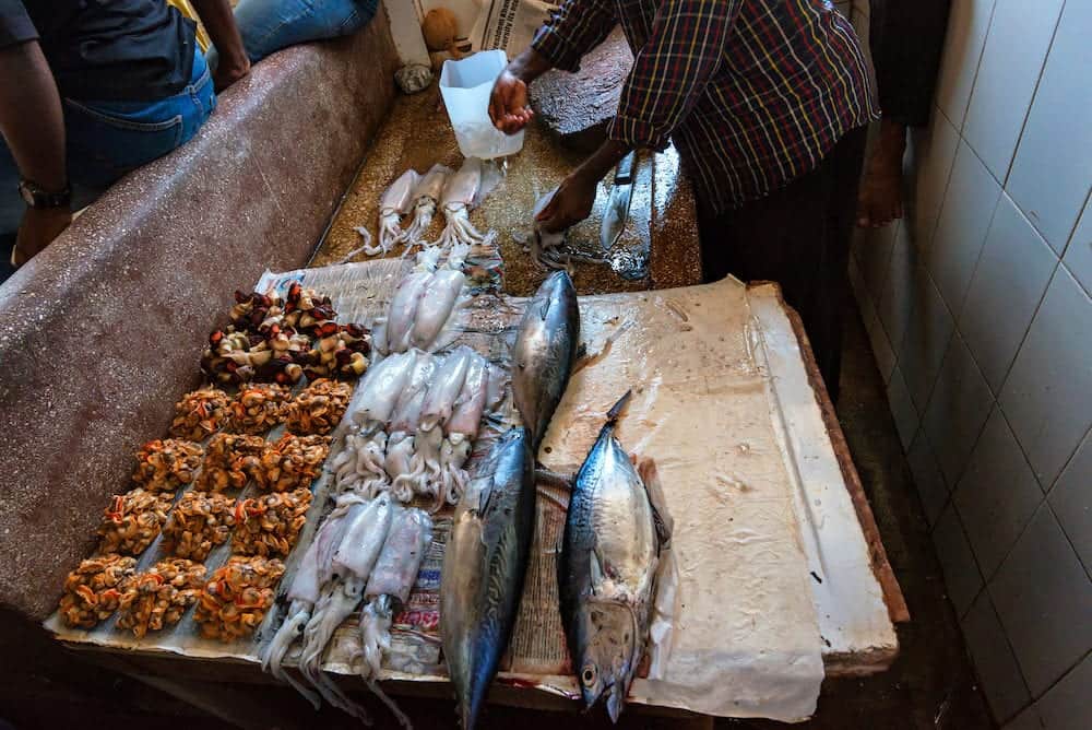 STONE TOWN, ZANZIBAR Local people selling sea food in fish market