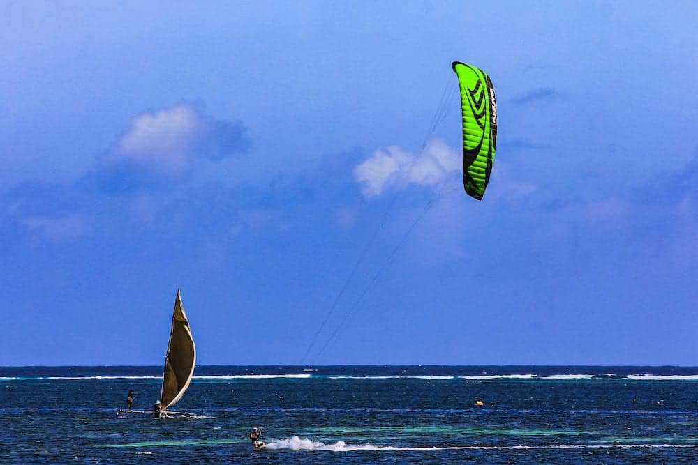 kiteboard surfer in high speed on Jambiani beach Zanzibar africa