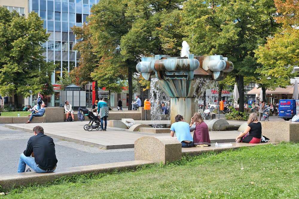 BERLIN GERMANY - People visit Wittenberg Square (Wittenbergplatz) in Schoeneberg district Berlin. Berlin is Germany's largest city with population of 3.5 million.