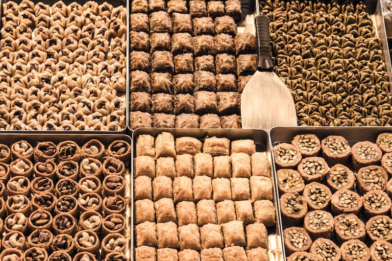 Turkish Baklava, filled with nuts, walnuts, pistaccios and almonds for sale on a market in the city center of Istanbul. It is one of the symbols of Turkey gastronomy and oriental pastries