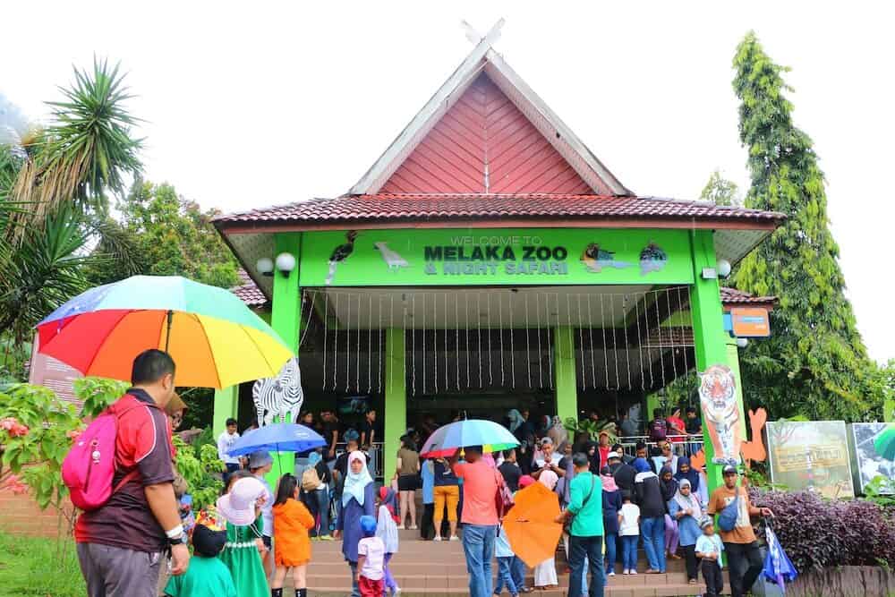 Ayer Keroh, Melaka, Malaysia People at the entrance of Melaka Zoo. It is the second largest Zoo in Malaysia. Located 13km outside Malacca city in Ayer Keroh,