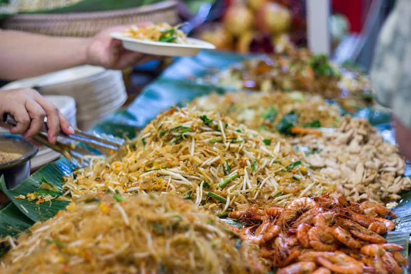 Close up cooking Pad Thai noodles, Thai street food in the market popular Thai Food Bangkok Thailand