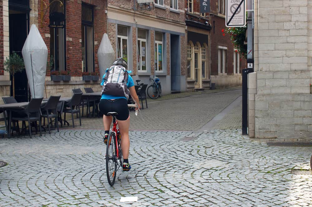 Girl on a bike in Leuven. Belgium.