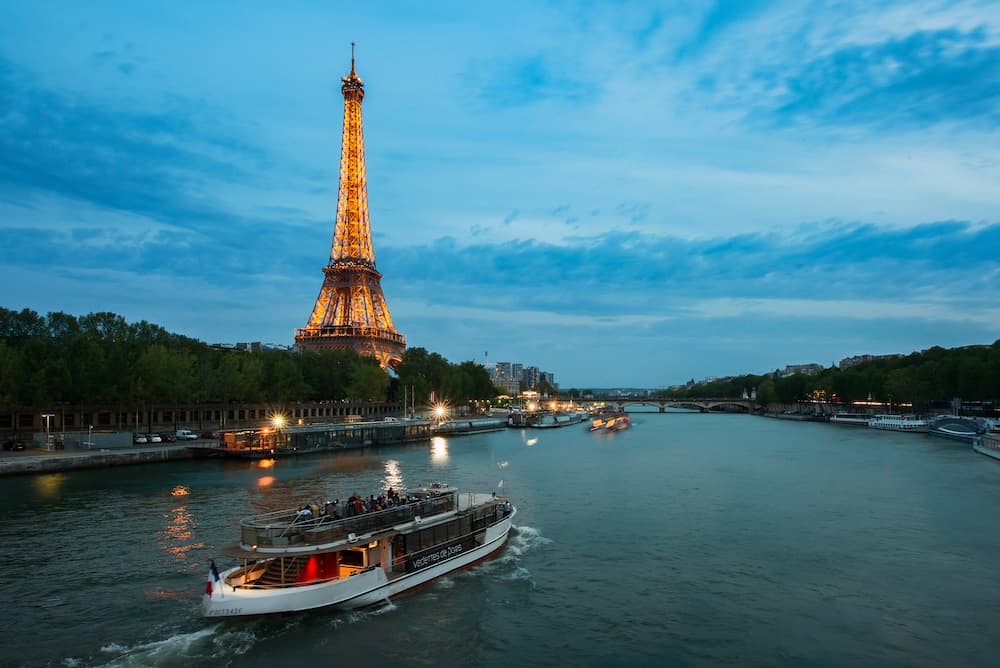 Paris, Fracne - : Seine river night view with Eiffel tower in Paris, France. Paris is the capital and most populous city of France.