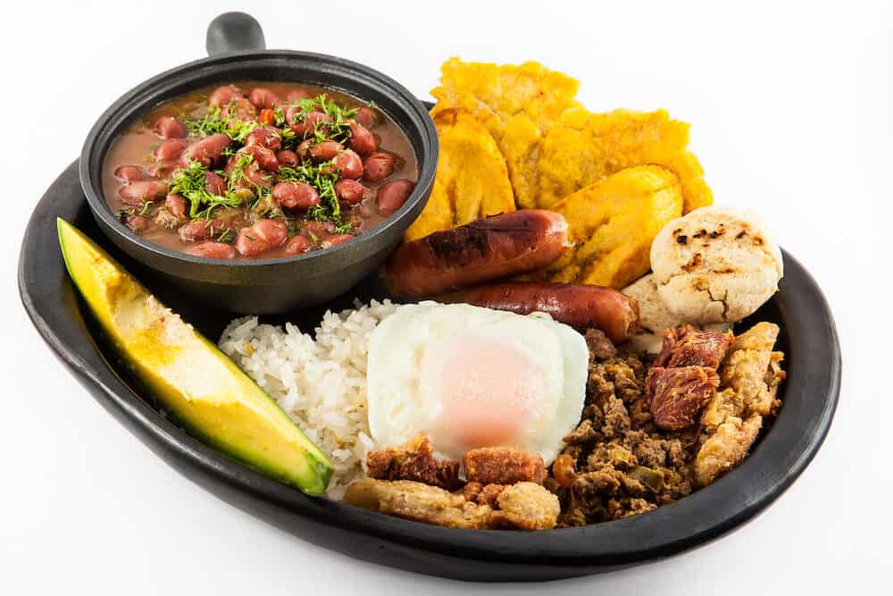 Traditional Colombian dish called Banda paisa: a plate typical of Medellin that includes meat, beans, egg and plantain