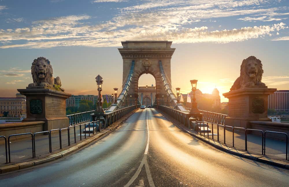 Statues of Lions on Chain Bridge in Budapest at sunrise, Hungary