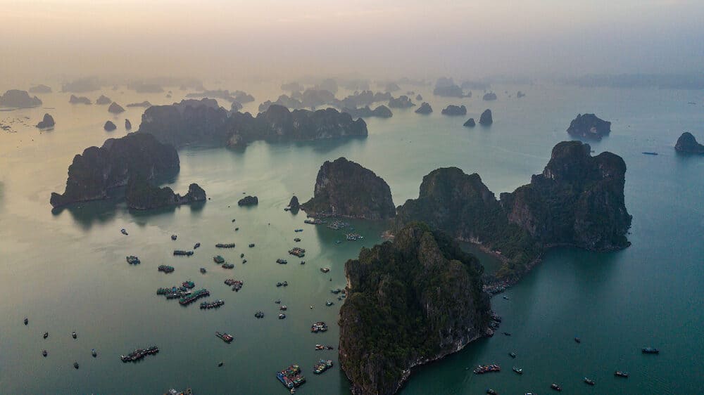 Aerial view rock island in Halong Bay City, Vietnam, Southeast Asia, UNESCO World Heritage Site, Junk boat cruise to Ha Long Bay, Popular landmark and famous destination of Vietnam.