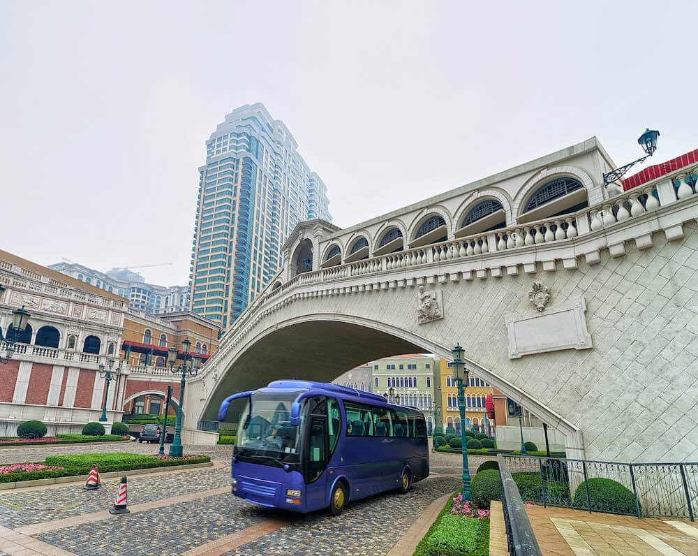 Macao China - Touristic bus at Venetian Macau Casino and Hotel luxury resort in Macao China