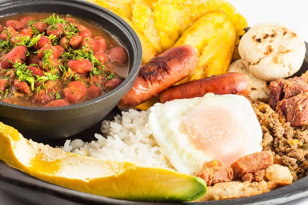 Traditional Colombian dish called Banda paisa: a plate typical of Medellin that includes meat, beans, egg and plantain