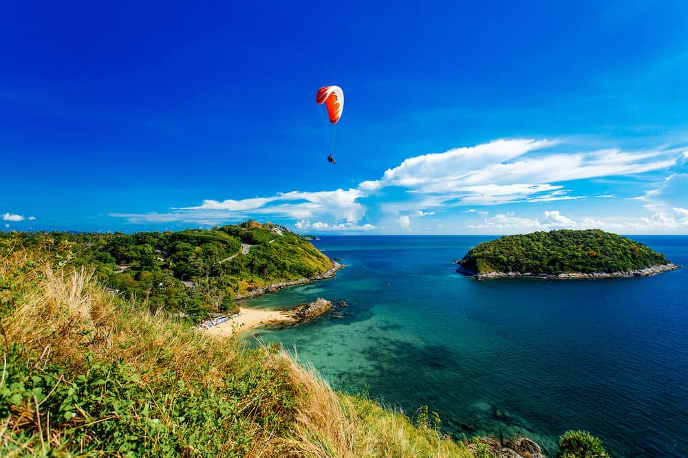Rawai Beach of Promthep Cape view point in blue sky with clouds, Phuket Thailand